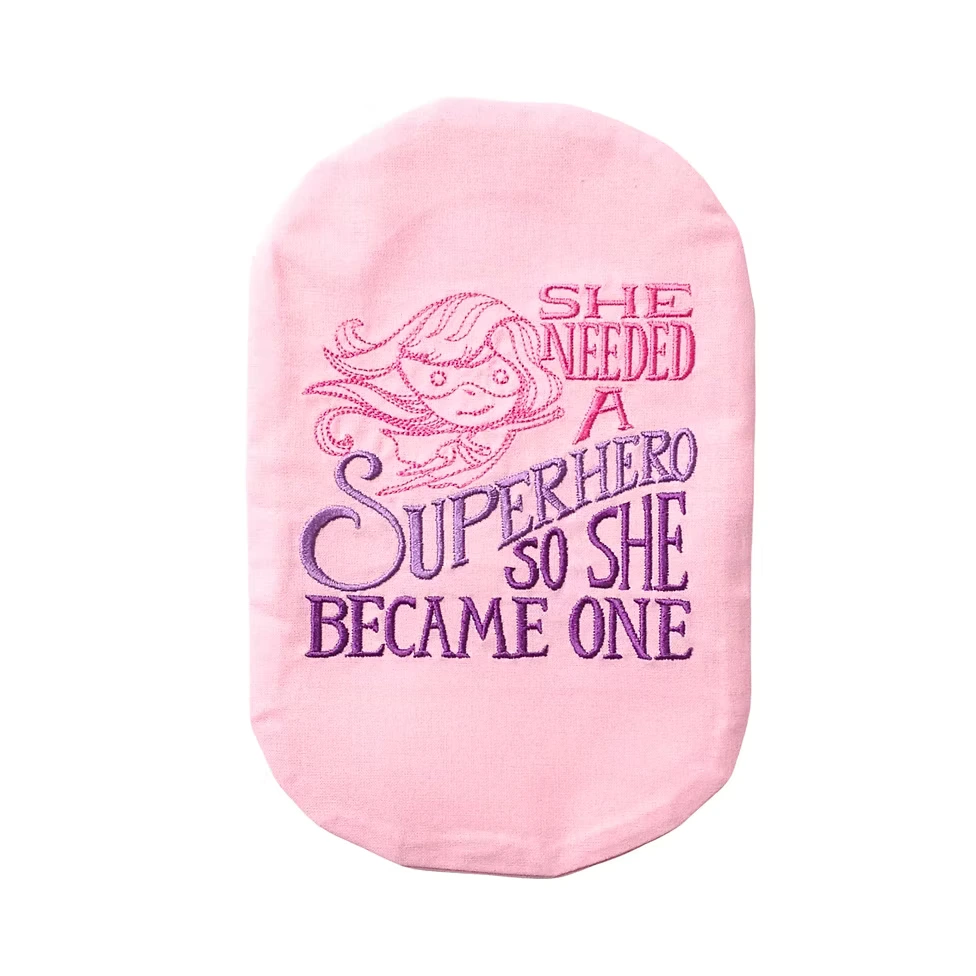 Pink Stoma bag which reads She Needed A Superhero So she Became One in pink and purple letters